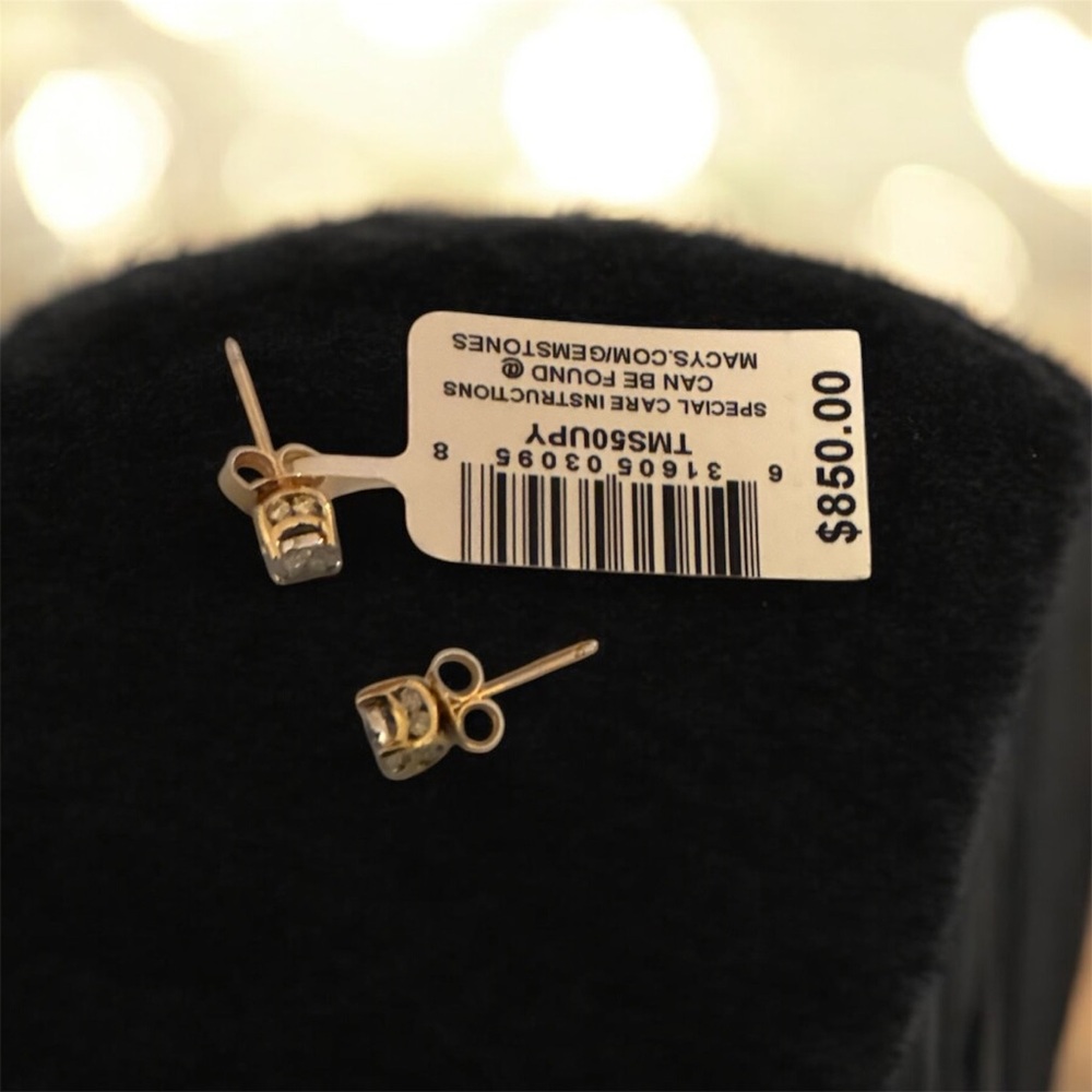Gold and Diamond stud earrings.